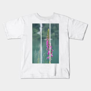 Wonderful landscapes in Norway. Blooming colorful lupine flowers in Norway in the wild grass. Blur background. Summer cloudy day(vertical) Kids T-Shirt